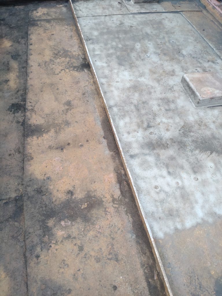 Cooper Painting Contractors Ltd sand blast the steel deck